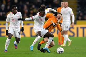 Domingos Quina takes on Regan Slater during Tuesday night's Yorkshire derby between Hull City and Barnsley. Picture: Bruce Rollinson