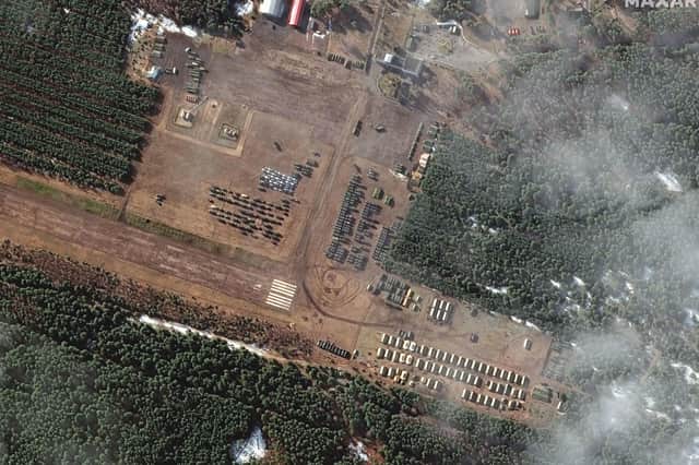 Satellite imagery provided by Maxar Technologies shows new deployments of troops and equipment that have been established in rural areas southwest of Belgorod, less than 20 kilometres to the northwest of the border with Ukraine. (Satellite image ©2022 Maxar Technologies via AP).
