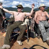 Vladimir Putin, 69, is a keen huntsman, often pictured on his way to shoot and kill animals or by the riverbank pulling in fish he's caught himeslf. Getty