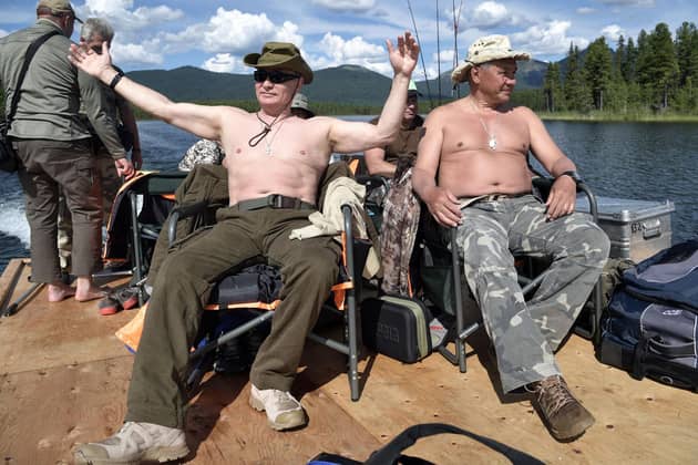 Vladimir Putin, 69, is a keen huntsman, often pictured on his way to shoot and kill animals or by the riverbank pulling in fish he's caught himeslf. Getty