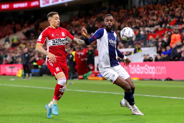 Middlesbrough's Marcus Tavernier (left) and West Bromwich Albion's Semi Ajayi battle for the ball at the Riverside Stadium. Picture: Richard Sellers/PA