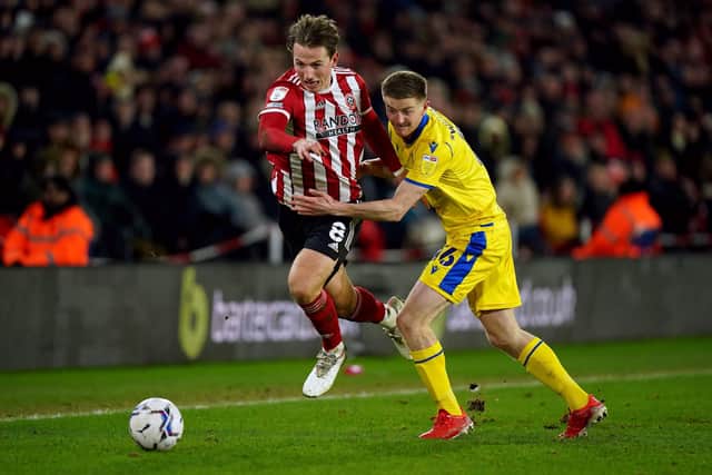 Sheffield United's Sander Berge and Blackburn Rovers' Darragh Lenihan (right) battle for the ball (Picture: Mike Egerton/PA)