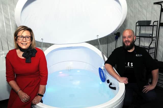 Peter Sullivan and his Investment Manager Gillian Pickard with one of the floatation tanks he has purchased