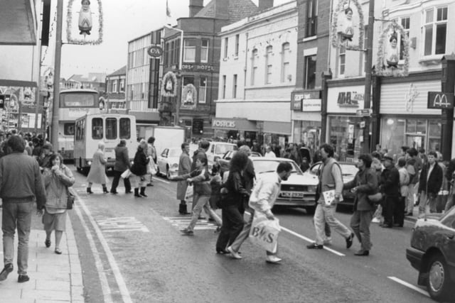 This image shows Friargate before it was pedestrianised, and was taken around Christmas time 1990