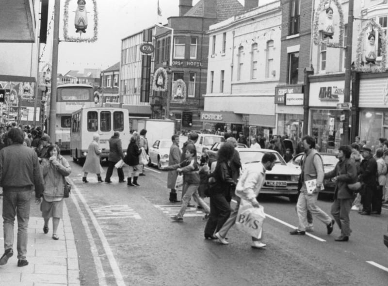 This image shows Friargate before it was pedestrianised, and was taken around Christmas time 1990