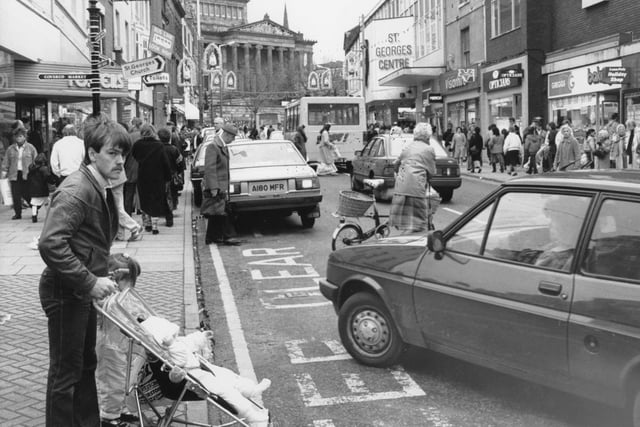 Christmas shopping in 1991 - look at how many shoppers there were crowding Friargate. And there's even a Zippy bus outside St George's Shopping Centre