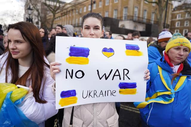Ukrainians gathered outside the entrance of 10 Downing Street yesterday.