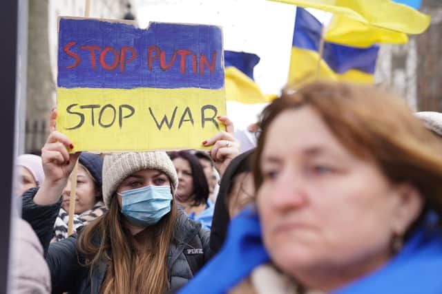 Ukrainians hold a protest against the Russian invasion of Ukraine outside Downing Street as Boris Johnson prepared to respond to the crisis.