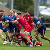 From the kitchen to rugby field: Sam Graham, centre, in action for Doncaster Knights who he is hoping to captain to a place in the Premiership next season. (Picture: Tony Johnson)