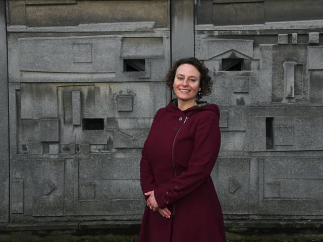 The University of York's new art curator, Helena Cox, in front of Concrete reliefs by Fred Millett, 1965. Picture : Jonathan Gawthorpe