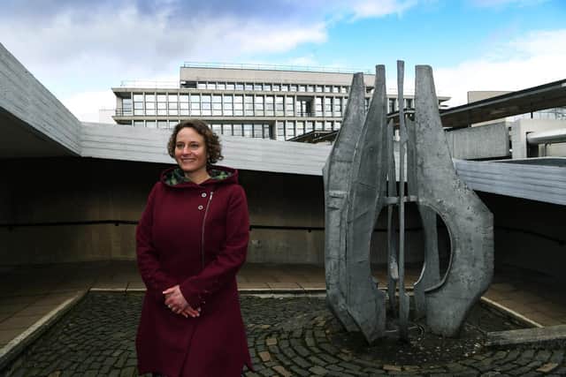 The University of York's new art curator, Helena Cox, with 'Untitled' by Austin Wright, 1967. Picture : Jonathan Gawthorpe