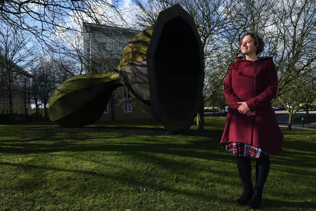 The University of York's new art curator, Helena Cox, with 'Beyond and Within' by Joanna Mowbray, 1995. Picture : Jonathan Gawthorpe