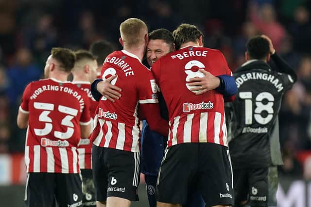 HITTING FORM: Sheffield United manager Paul Heckingbottom with Oliver McBurnie and Sander Berge following the Blades' win over Blackburn Rovers. Picture: Mike Egerton/PA Wire.