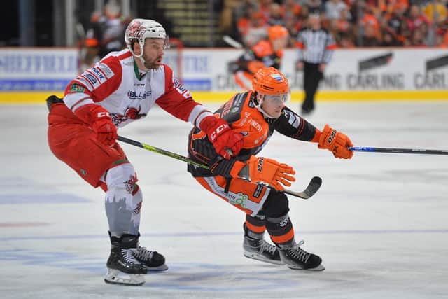Brandon Whistle - right - will again ice for Sheffield Steelers this weekend, coming up against his dad, Dave Whistle, who is assistant coach on the Nottingham Panthers bench. Picture: Dean Woolley/EIHL.