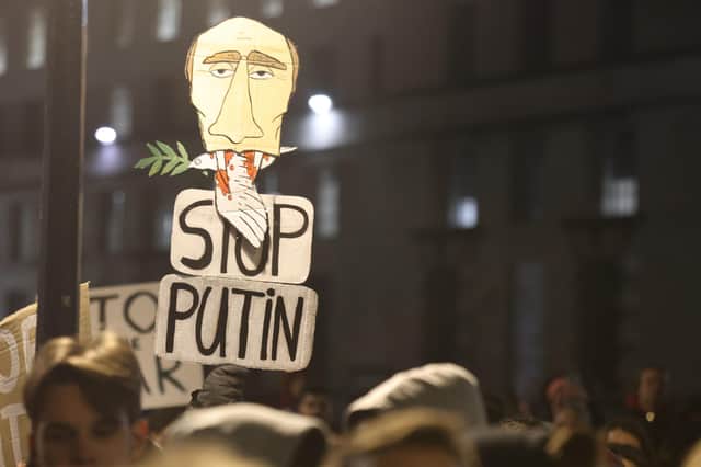 Ukrainians hold a protest against the Russian invasion of Ukraine outside Downing Street.
