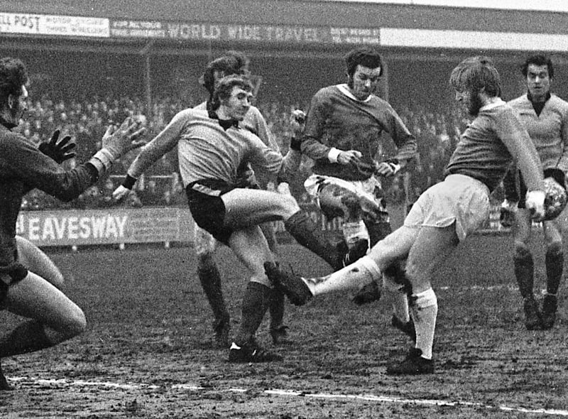 Ian Ledgard has the ball taken off his toe as he joins the action with Joe Fletcher in the Boston United area in the Northern Premier League fixture at Springfield Park on Saturday 8th of January 1972. The match was a 0-0 draw.