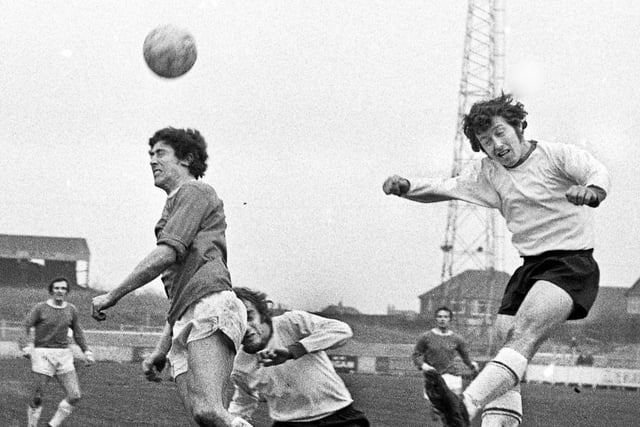 Wigan Athletic forward Geoff Davies gets his head to the ball before South Liverpool defenders in the Northern Premier League match at Springfield Park on Saturday 19th of February 1972. Wigan lost 1-0.