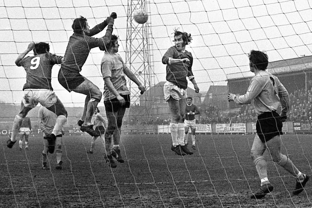 Wigan Athletic's Geoff Davies and Jim Fleming challenging for the ball in the FA Trophy 3rd round match against Barnet at Springfield Park on Saturday 26th of February 1972. Wigan lost the match 2-1 with Joe Fletcher scoring the Latic's goal.