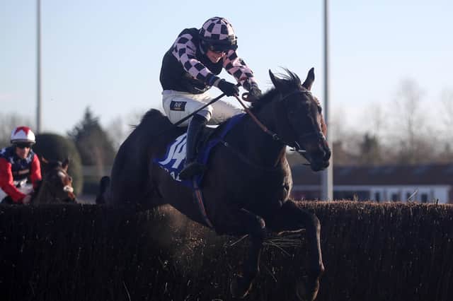 Cap Du Nord ridden by Jack Tudor go on to win the Coral Trophy Handicap Chase at Kempton Park racecourse.