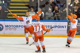 RECORD BREAKER: Robert Dowd signals his delight after setting a new record for goals scored in the Elite League era by a Sheffield Steelers' player, making it 5-3 against  hosts Nottingham Panthers on Saturday night. Picture courtesy of Scott Antcliffe.