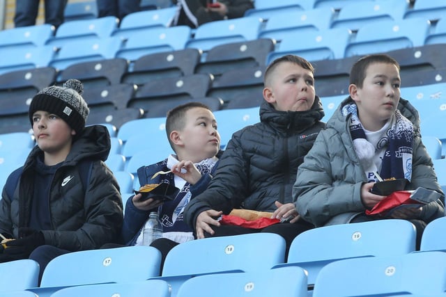 These young North Enders tuck into their pre-match pies at Coventry