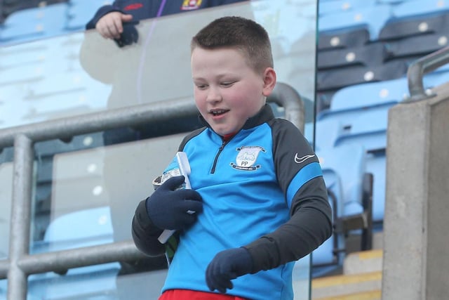 This young lad looks for his seat in the away end