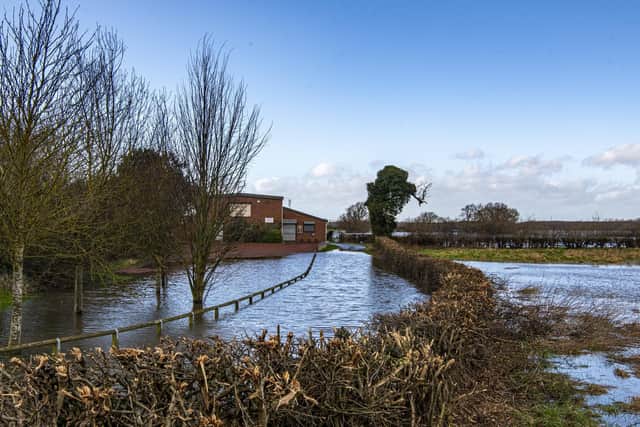 Flood water close to Ryther Village Hall near Tadcaster. Picture Tony Johnson