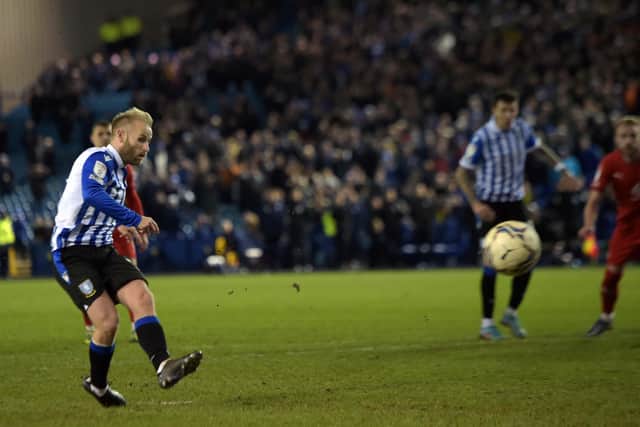 Barry Bannan scores for the Owls against Wigan Athletic (Picture: Steve Ellis)