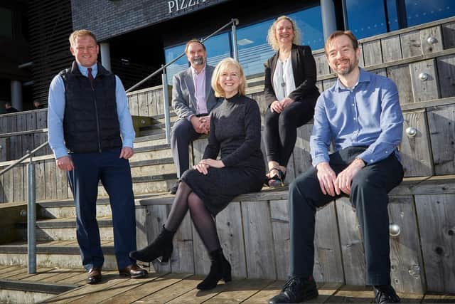 Wykeland Group’s John Gouldthorp,left, with Vertual executives Professor Andy Beavis, Debra Leeves, Fiona Law, and James Ward. Picture: R&R Studio
