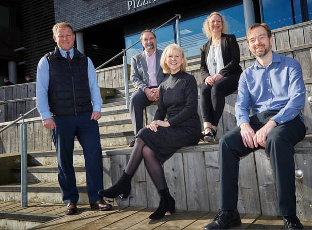 Wykeland Group’s John Gouldthorp,left, with Vertual executives Professor Andy Beavis, Debra Leeves, Fiona Law, and James Ward. Picture: R&R Studio