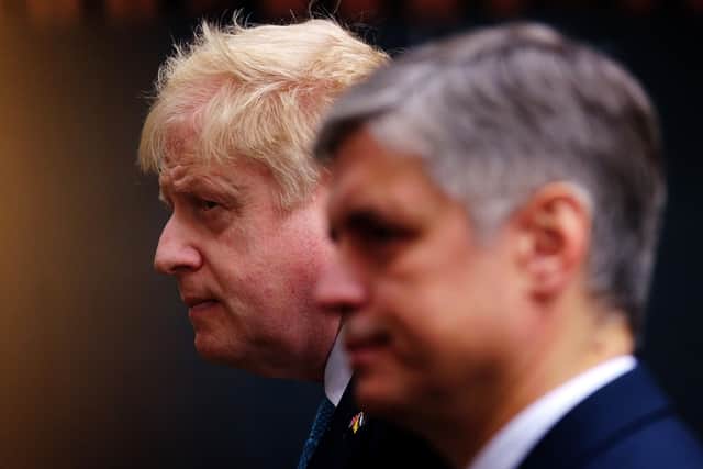 Prime Minister Boris Johnson leaves 10 Downing Street, London, with Ambassador of Ukraine to the UK Vadym Prystaiko, to attend Prime Minister's Questions at the Houses of Parliament.