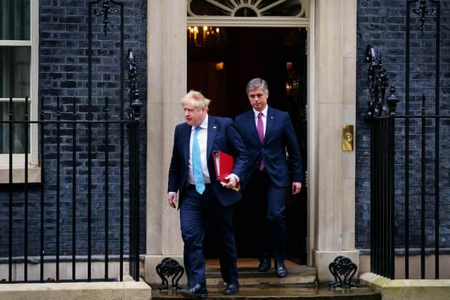 Prime Minister Boris Johnson leaves 10 Downing Street, London, with Ambassador of Ukraine to the UK Vadym Prystaiko, to attend Prime Minister's Questions at the Houses of Parliament