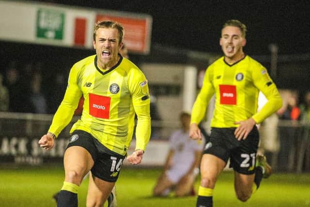Alex Pattison celebrates after firing Harrogate Town into a first-half lead against Port Vale. Picture: Matthew Appleby
