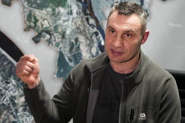 Vitali Klitschko, Kyiv Mayor and former heavyweight champion gestures while speaking during his interview with the Associated Press in his office in the City Hall in Kyiv, Ukraine, Sunday, Feb. 27, 2022. A Ukrainian official says street fighting has broken out in Ukraine's second-largest city of Kharkiv. Russian troops also put increasing pressure on strategic ports in the country's south following a wave of attacks on airfields and fuel facilities elsewhere that appeared to mark a new phase of Russia's invasion. (AP Photo/Efrem Lukatsky).