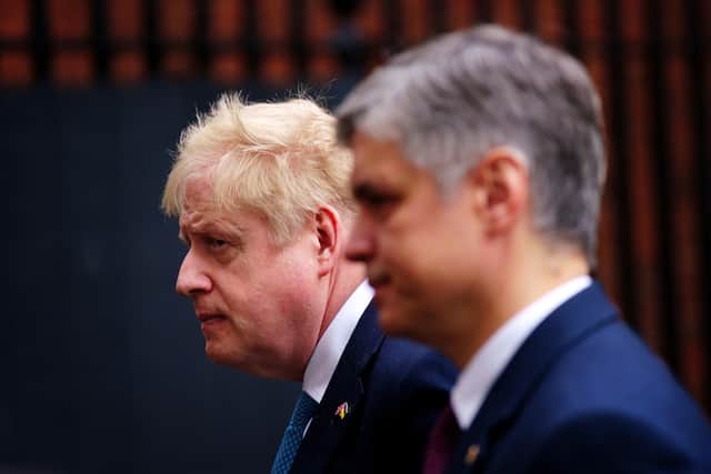 Prime Minister Boris Johnson leaves 10 Downing Street, London, with Ambassador of Ukraine to the UK Vadym Prystaiko, to attend Prime Minister's Questions at the Houses of Parliament.