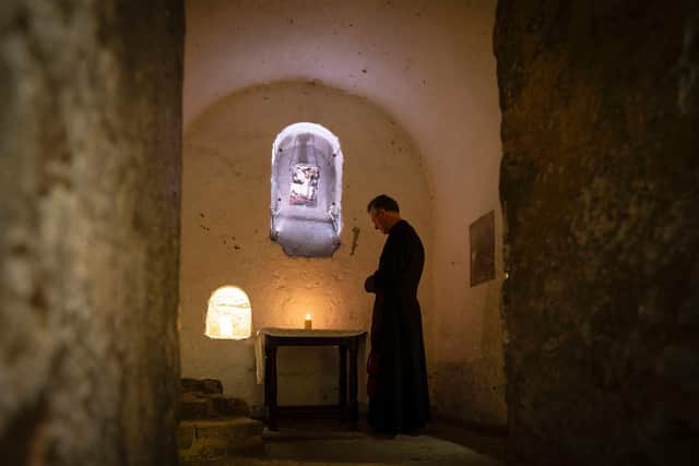 Very Rev John Dobson in the Cathedral's ancient crypt, build by Saint Wilfrid in 672, image by Joseph Priestley