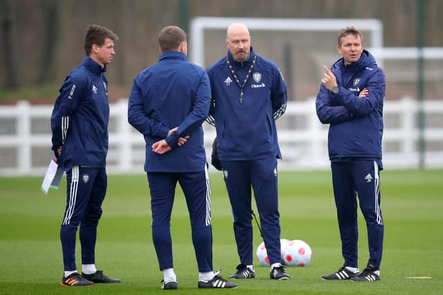 Leeds United head coach Jesse Marsch (right), assistant Cameron Toshack (second right) and coach Franz Schiemer (left) during a training session at Thorp Arch. Pictures: Simon Marper/PA