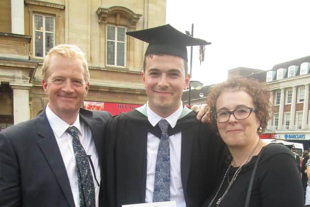 Jack Ritchie (centre) at his graduation with his parents Charles and Liz Ritchie