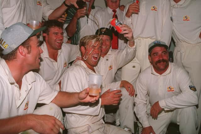 MAN OF THE MOMENT: Man-of-the-match Shane warne celebrates with his Australia team-mates after defeating England in the first Test Match at The Gabba in Brisbane in November 1994 Picture: Ben Radford/ALLSPORT (Getty Images)