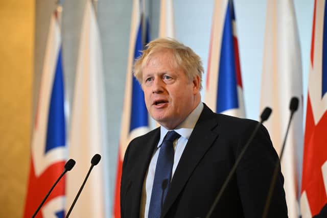 Prime Minister Boris Johnson attends a press conference with Polish Prime Minister Mateusz Morawiecki at the Chancellery in Warsaw, Poland, on March 1