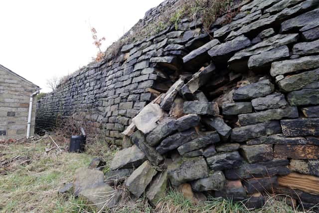A fresh collapse at South Lane in Holmfirth showing more damage to a retaining wall. (Image: Andy Catchpool)