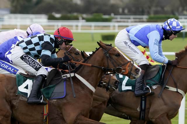 This was Cormier and Jonathan Burke (red cap) winning at Cheltenham at the end of January - the horse will land a £100,000 bonus if he wins the County Hurdle at this month's National Hunt Festival.