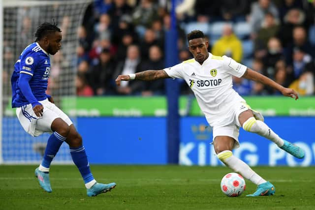 NEARLY: Leeds United's Junior Firpo takes on Leicester City's Ademola Lookman Picture: Jonathan Gawthorpe
