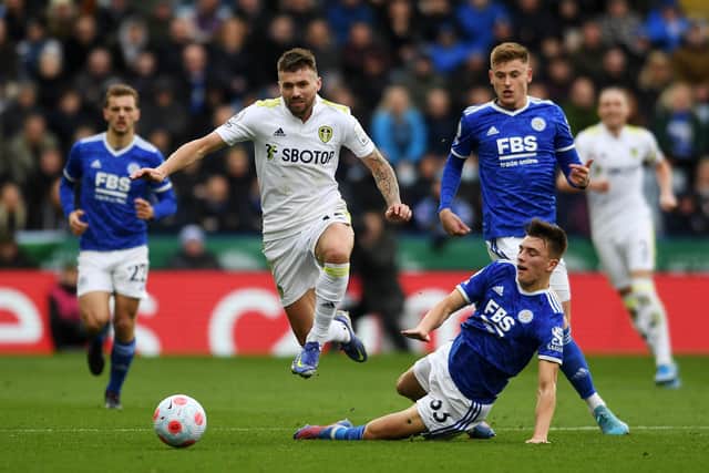 Leeds United's Stuart Dallas skips away from Leicester City's Luke Thomas Picture: Jonathan Gawthorpe