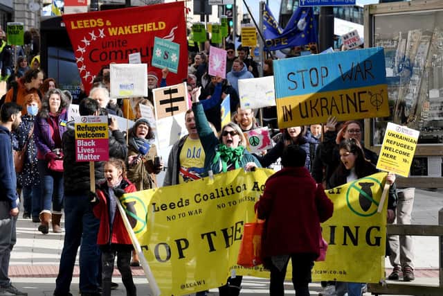 Crowds in York, Hull and Leeds chanted, waved banners and decorated themselves in the Ukrainian colours of blue and yellow at the events, many of which were co-organised by pressure groups against war.
Pictured: Leeds rally