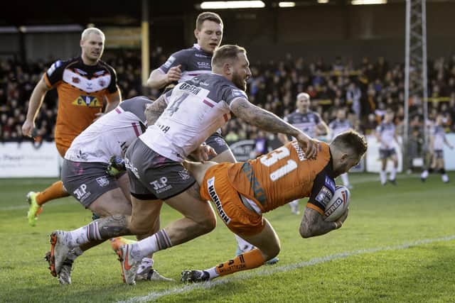 Barging over: Hull FC's Josh Griffin can't prevent Castleford's Gareth O'Brien from scoring a try. Picture by Allan McKenzie/SWpix.com