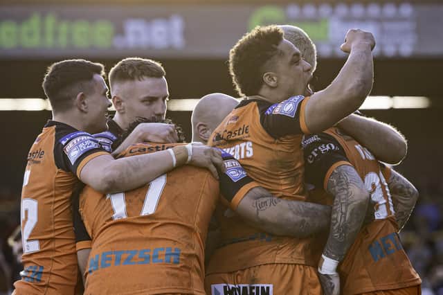 Come on: Castleford's Derrell Olpherts, right, celebrates Gareth O'Brien's try against Hull FC. Picture by Allan McKenzie/SWpix.com