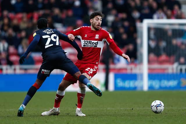 Middlesbrough's Matt Crooks and Luton Town's Amari'i Bell (Pictures: PA)