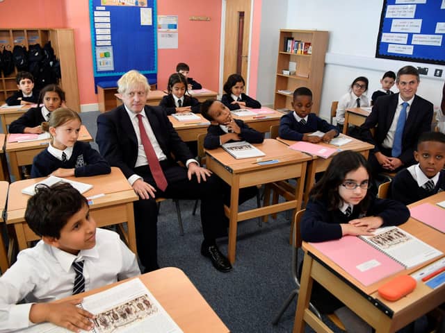 Boris Johnson and Gavin Williamson undertake a joint visit to a school in September 2019.
