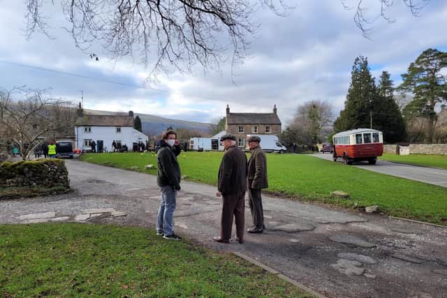 Filming on the village green